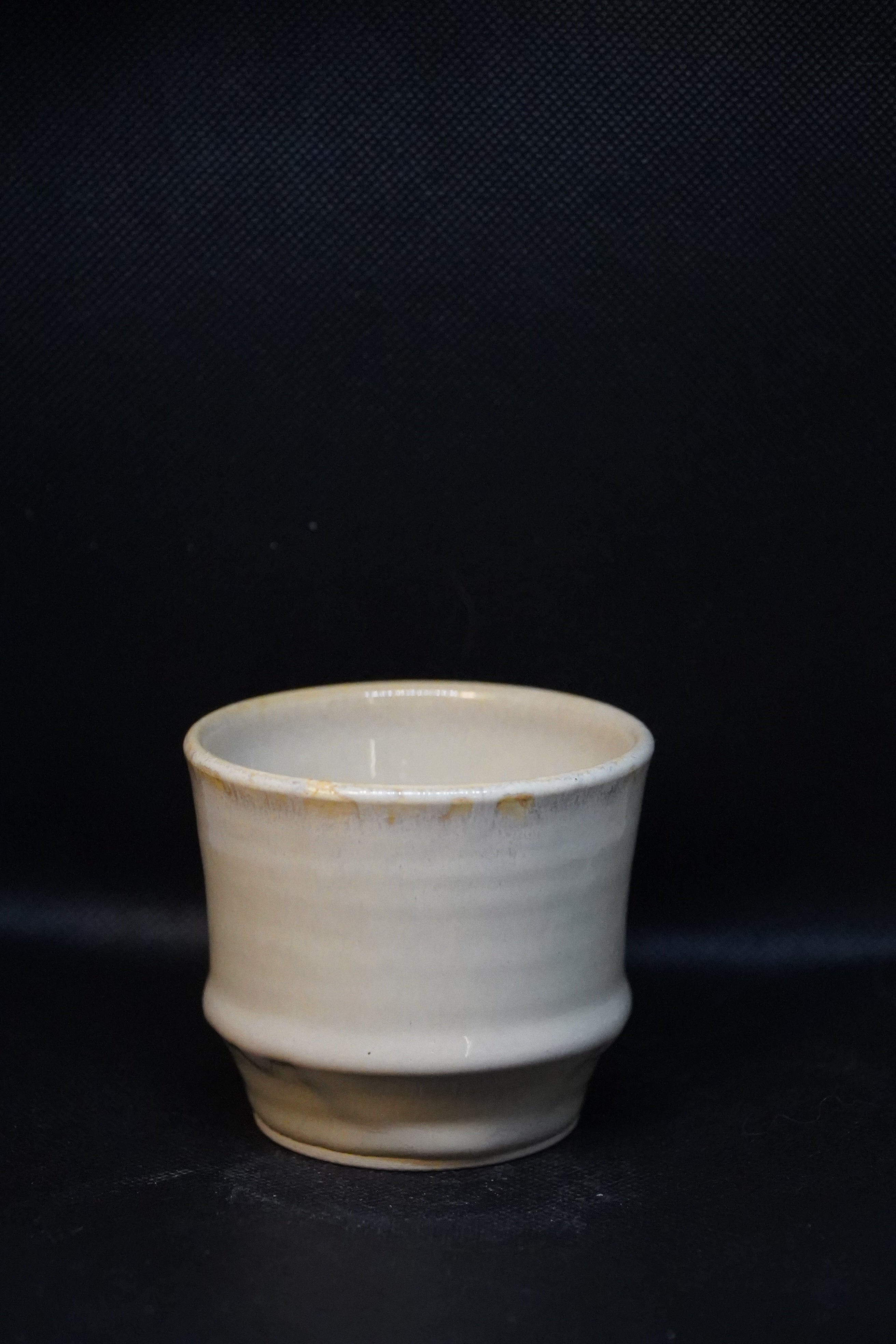 Handmade ceramic tea cup with shadow green and shorebreak glazing 250ml